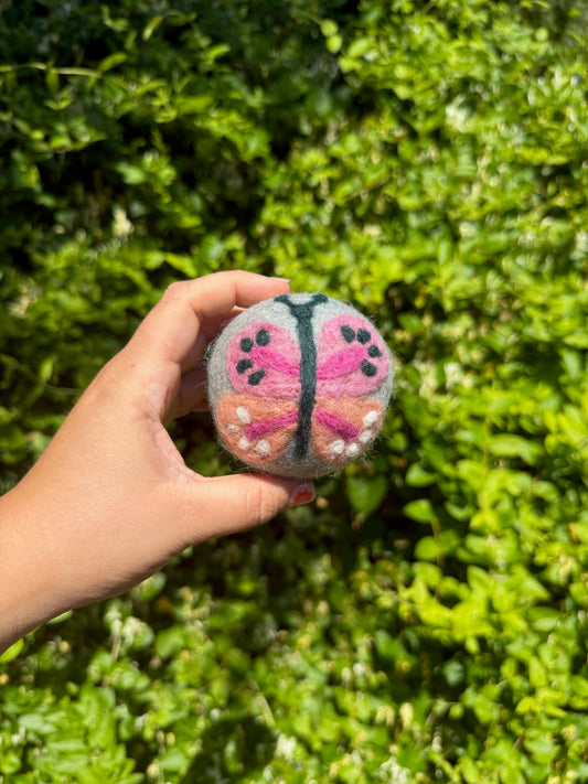 Pink Butterfly on Blue Wool Dryer Ball